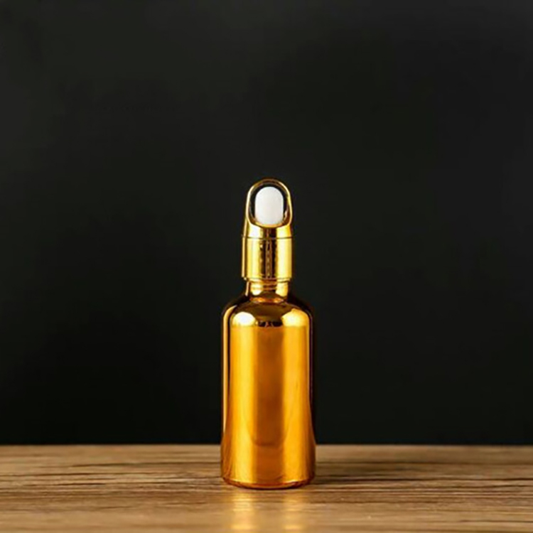 Golden Essential Oil Bottle